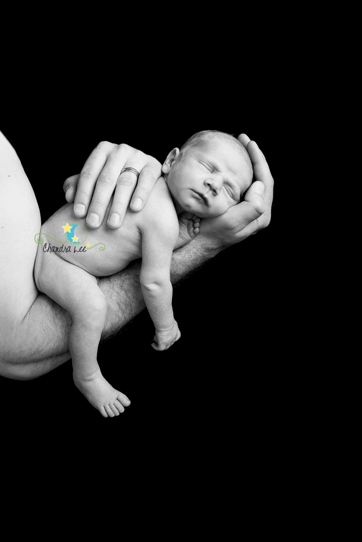 Black and White Portrait of Baby Ayden on his Daddys Arm