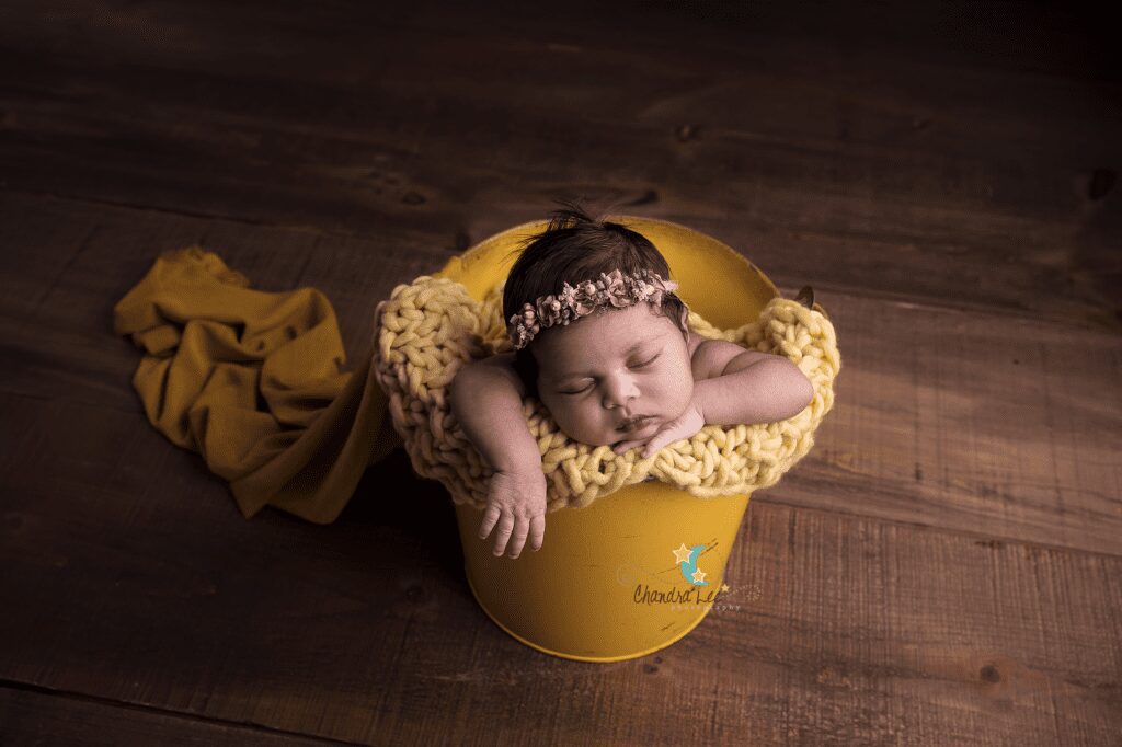 Baby Sklyar Newborn Photo in Yellow Bucket